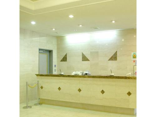 a large bathroom with a counter and a mirror at Hotel Montagne Matsumoto - Vacation STAY 73668v in Matsumoto