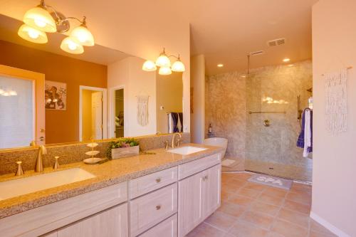 a bathroom with two sinks and a shower at Sedona Getaway with Sunlit Patio Near Bell Rock! in Sedona