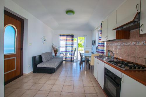 Kuchyň nebo kuchyňský kout v ubytování Apartment Goran