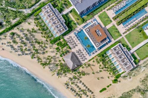 an aerial view of a beach with condos at Live Aqua Punta Cana - All Inclusive - Adults Only in Punta Cana