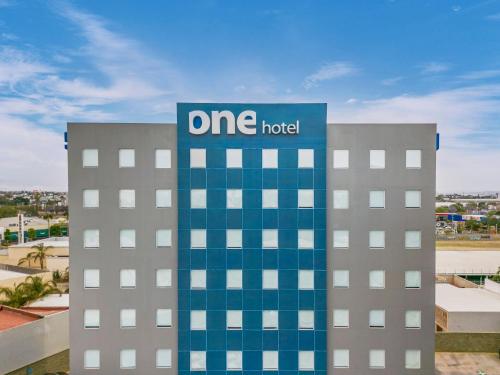 a one hotel building with the one hotel sign on it at One Leon Poliforum in León