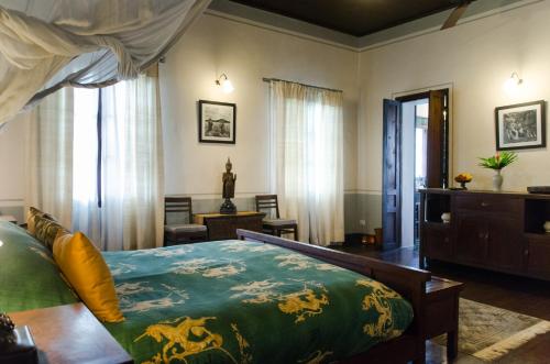 Katil atau katil-katil dalam bilik di Satri House Hotel