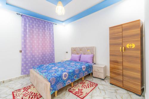 Katil atau katil-katil dalam bilik di auberge Lacasa latifa vue sure mere moulay bousselham