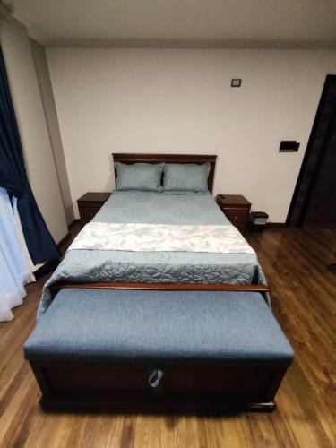 Ein Bett oder Betten in einem Zimmer der Unterkunft GZ GUEST HOUSE