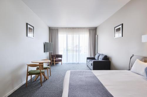 Postel nebo postele na pokoji v ubytování Abode Gungahlin