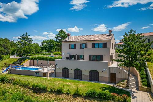 an aerial view of a house with a swimming pool at Luxury Pool Villa Gradin - Happy Rentals in Gračišče