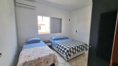 Postel nebo postele na pokoji v ubytování Pousada Emanuelli