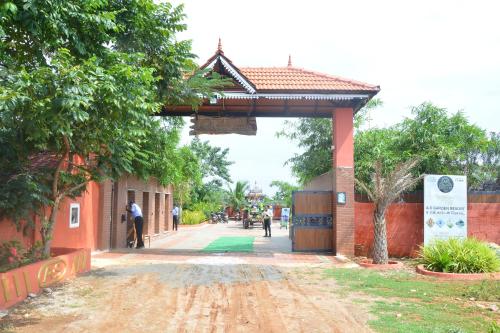 an entrance to a building with a gate at AS Garden Villa in Ranipet