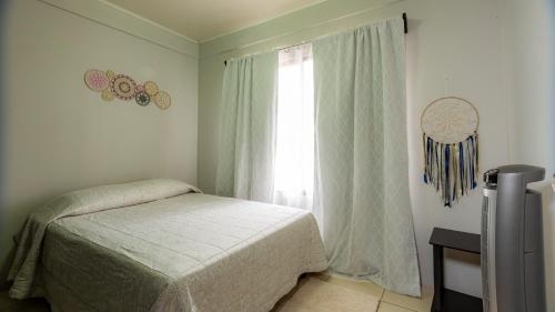 Кровать или кровати в номере Casa Las Tres Marias