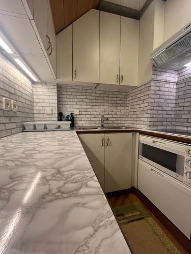Una cocina o zona de cocina en Little King - Feel like at home