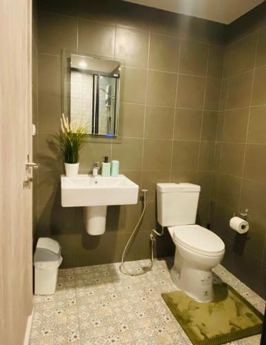 a bathroom with a toilet and a sink at A luxurious and romantic at Lacasita Huahin by Pikul in Hua Hin