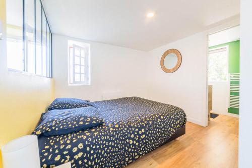Postel nebo postele na pokoji v ubytování Les chevrefeuilles Appartement en residence