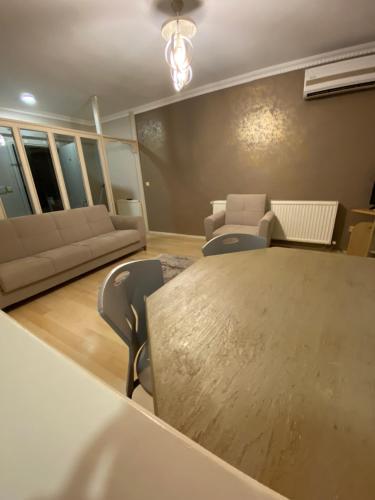 Area soggiorno di EVİM APART HOTEL