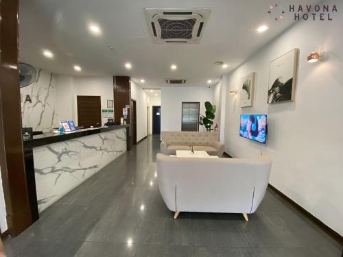TV a/nebo společenská místnost v ubytování Havona Hotel - Kulai