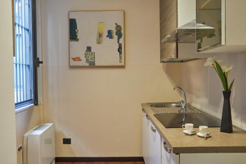 Una cocina o cocineta en Milan Retreats Duomo