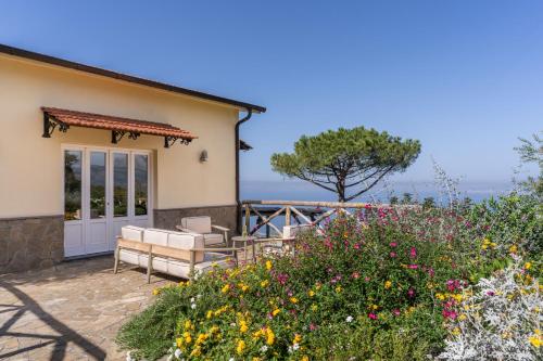 a villa with a view of the ocean at Villa Giulia Boutique Views Pool and Guest Services by Feeling Italy in Sorrento