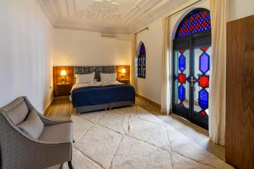 Llit o llits en una habitació de The Grand Riad and Spa