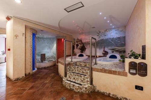 a bathroom with two sinks in a room at Hotel Job in Monclassico