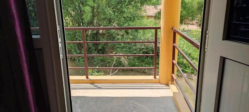 Balkón nebo terasa v ubytování Bardia Jungle Cottage
