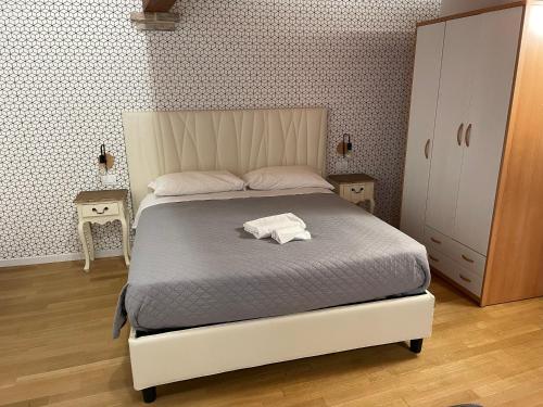 Postel nebo postele na pokoji v ubytování Residence Cavour 63