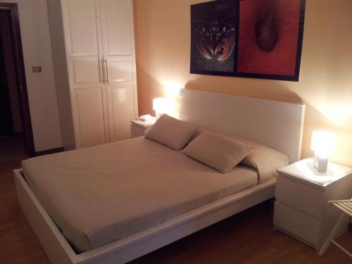 Postel nebo postele na pokoji v ubytování Hotel Moreri