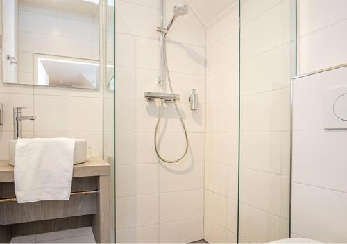 Ванная комната в Fletcher Hotel Landgoed Huis te Eerbeek