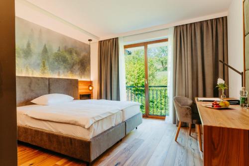 Postel nebo postele na pokoji v ubytování Seminarhotel Lengbachhof GmbH