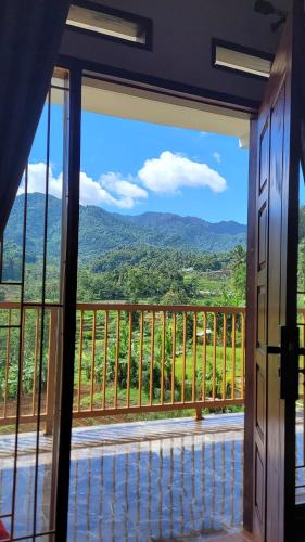 a view from a door of a balcony with a view at Villa Bumisoka in Purwakarta