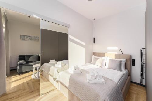 Lova arba lovos apgyvendinimo įstaigoje Apartament Granitowy Ku Morzu by HolidaySun