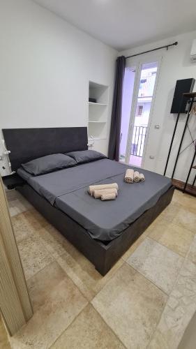 מיטה או מיטות בחדר ב-Sedici Scalini