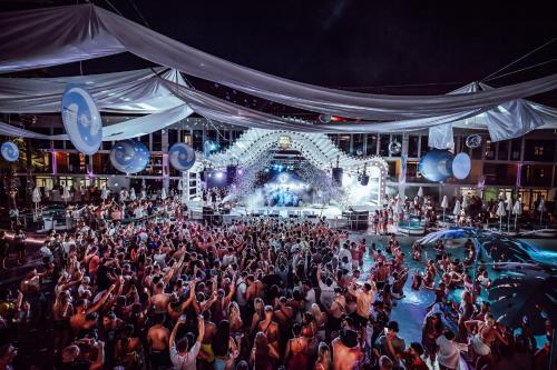 a crowd of people standing in front of a stage at Ibiza Rocks Hotel - Adults Only in San Antonio
