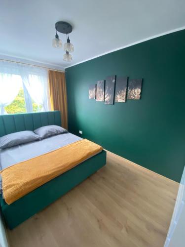 Postel nebo postele na pokoji v ubytování Apartament II Glamour Work&Relax, obok ARENY Gliwice, FV
