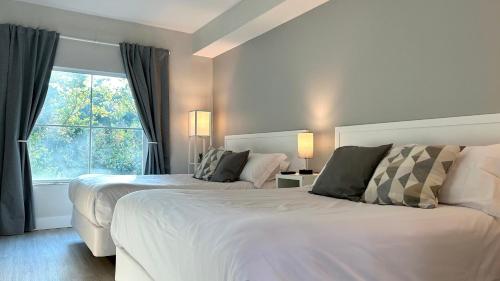 Posteľ alebo postele v izbe v ubytovaní HSO - Family Apartments Close to Disney World & Universal