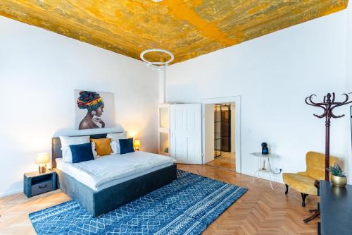 a bedroom with a bed and a wooden ceiling at Schiller Rooms in Sibiu