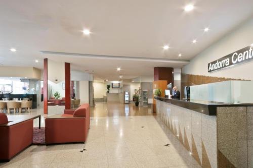 a lobby of a hotel with a waiting area at Hotel Best Andorra Center in Andorra la Vella