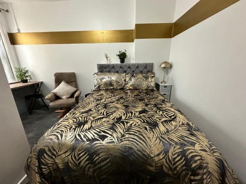 a bedroom with a bed with a zebra print blanket at B&B Runway Blackpool - Minutes From Winter Gardens - Dog Friendly - Exceptionally Quiet - Very Close H&A Social Club in Blackpool