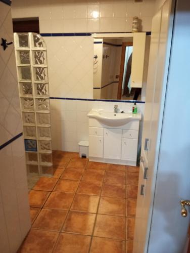 a bathroom with a sink and a toilet and a mirror at Maittia-Larraona in Larraona