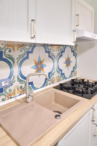 Dapur atau dapur kecil di Le Isole di MadamA
