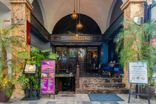 a building with a entrance to a restaurant at O'Gallery Premier Hotel & Spa in Hanoi