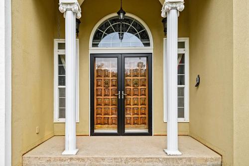 a front door of a building with two columns at Mulgrave Mansion in Mulgrave