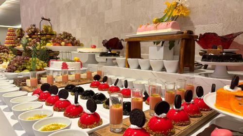 a buffet with many different types of desserts on display at Royal Azur Thalassa in Hammamet