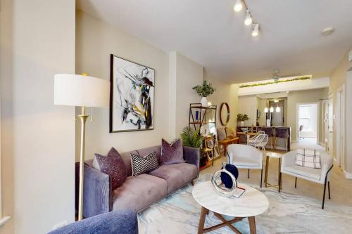 a living room with a couch and a table at River North Deltee in Chicago