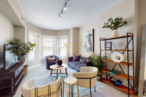 a living room with a couch and chairs at River North Deltee in Chicago