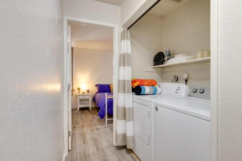 a white kitchen with a bed in a room at Tuolumne Vacation Rental about 45 Mi to Yosemite in Tuolumne