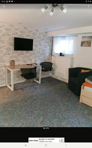 TV a/nebo společenská místnost v ubytování Gästezimmer Neumann