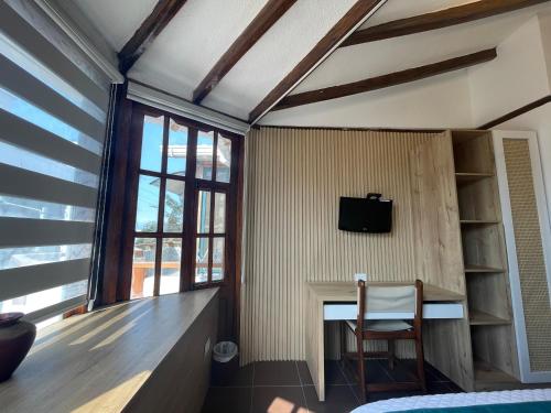 Μια τηλεόραση ή/και κέντρο ψυχαγωγίας στο Hosteria Punta Blanca