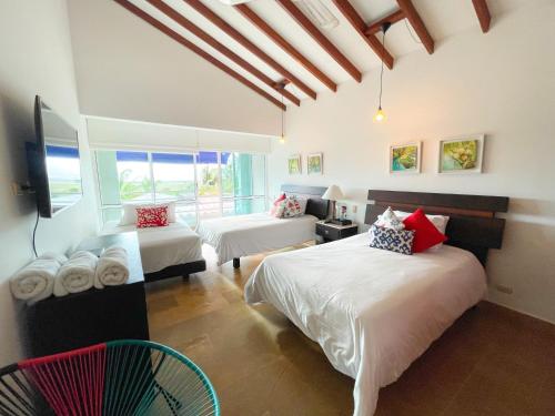 Voodi või voodid majutusasutuse Casa de Playa toas