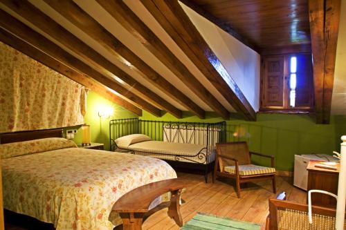 Ένα ή περισσότερα κρεβάτια σε δωμάτιο στο Posada Montero de la Concha