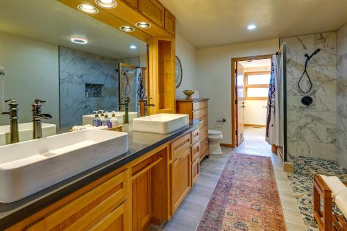 a bathroom with a large sink and a shower at Peaceful Sedona Home - Walk to Amitabha Stupa! in Sedona