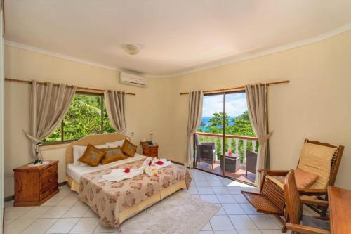 Katil atau katil-katil dalam bilik di Spacious House with Shared Pool in Machabee